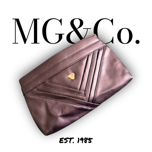 The Aubergine Clutch — Est. 1985